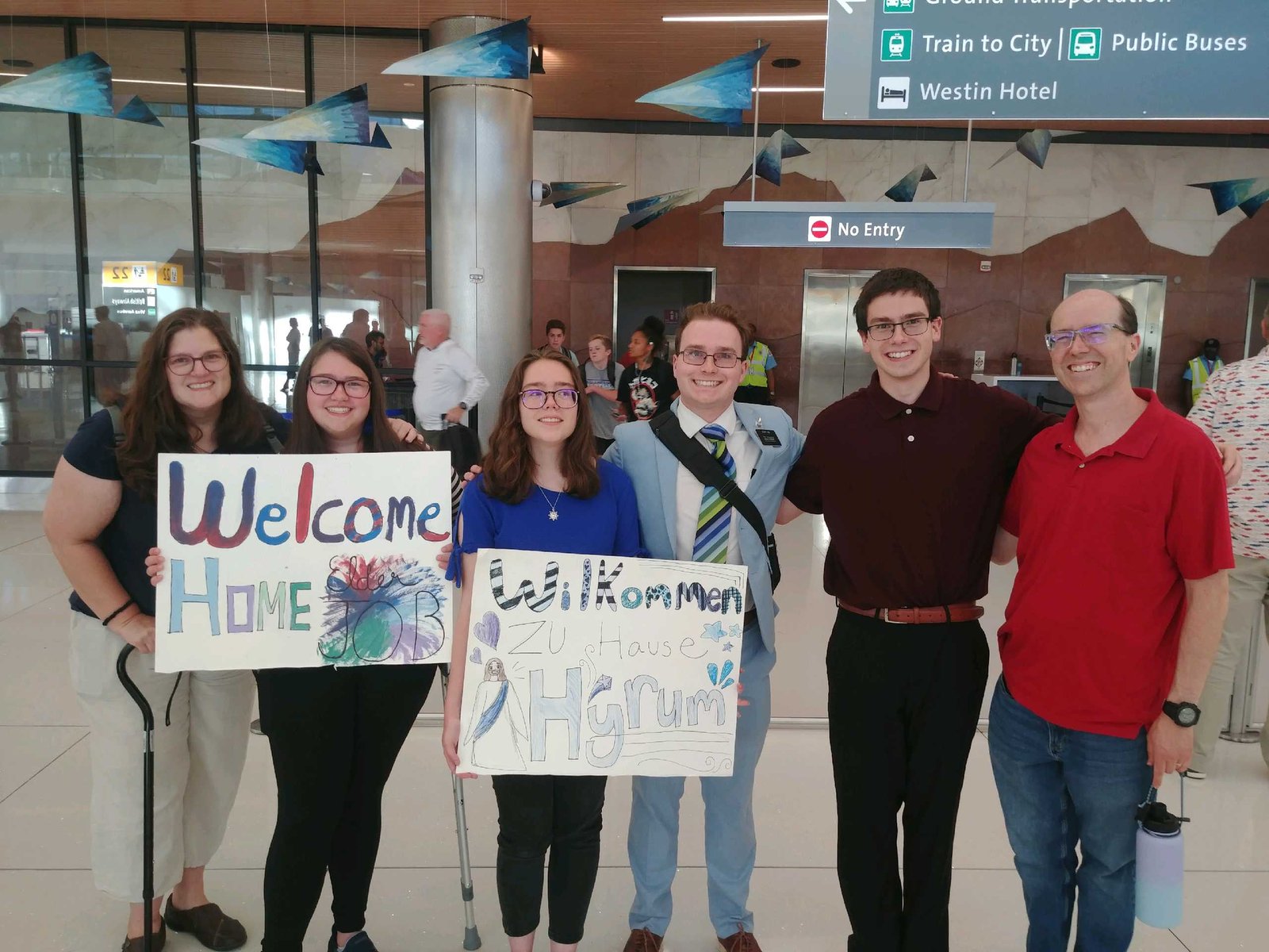 Welcoming Hyrum home at the airport